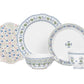 The Juliska Villa Seville Chambray Dinnerware Collection is a five-piece set of white ceramic with blue and green floral motifs, including a dinner plate, salad plate, bowl, cup, and decorative plate.
