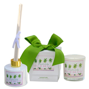 The Perfectly Palm Beach Signature Scent Collection features a reed diffuser, candle, and gift box—each adorned with palm tree graphics—to infuse your home with the brand’s signature Palm Beach fragrance.