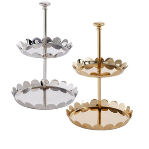 The Zodax Scalloped Two-Tier Tray Collection displays silver and gold trays with scalloped edges and central handles, set side by side on a white background.