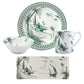 The Depareillees Vert Dinnerware and Serveware Collection by Gien France features a plate, bowl, mug, and rectangular dish adorned with monochrome scenes of palm trees, a mosque, and a sailboat—unique additions to your table.