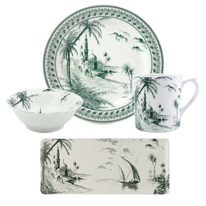The Depareillees Vert Dinnerware and Serveware Collection by Gien France features a plate, bowl, mug, and rectangular dish adorned with monochrome scenes of palm trees, a mosque, and a sailboat—unique additions to your table.