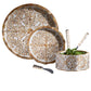 The Mya Inlay Serving and Decor Collection by Be Home features a brown and white leafy pattern, including two plates, a salad bowl with salad, two mother of pearl inlay serving spoons, and a spreader knife.