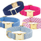 The Fabric Dog Collar Collection by Foggy Dog features five luxe, hypoallergenic collars in colorful patterns, each with a gold metal buckle and D-ring, displayed on a white background.