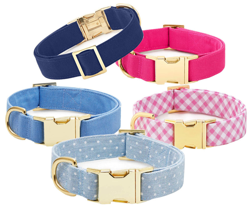 The Fabric Dog Collar Collection by Foggy Dog features five luxe, hypoallergenic collars in colorful patterns, each with a gold metal buckle and D-ring, displayed on a white background.