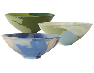 Three ceramic bowls from the Paul Schneider Ceramics Geode Bowl Collection in green, blue, and cream feature marbled swirls, adding vibrant color when displayed on a white background.