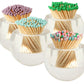 The Acrylic Match Striker Collection by Tart by Taylor includes four clear glass jars of wooden matches with pastel tips—purple, green, blue, and a pink/blue/green mix—each topped with an acrylic striker for a chic coffee table accent.