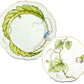 From the Garden Leaves Dinnerware Collection by Anna Weatherley, these two hand-painted porcelain plates feature scalloped edges, green leaf motifs, butterflies, insects, and elegant gold trim.