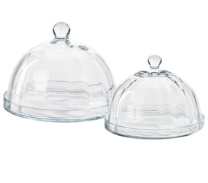 The Zodax Loulou Optic Pastry Glass Plates feature clear glass cloches with knobs and matching round bases, ideal for displaying desserts elegantly against a white background.