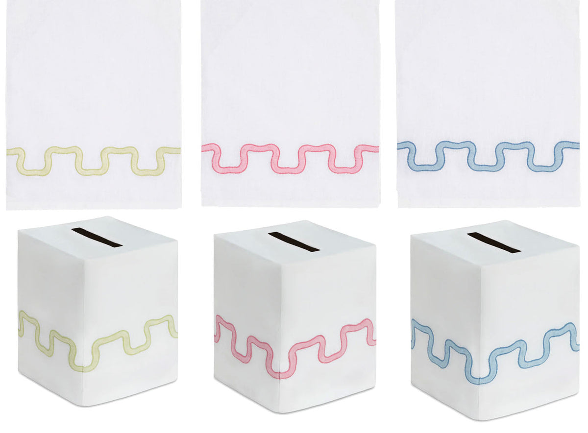 Haute Home Waverly Bath Accessories featuring three sets of premium Italian linen towels and square tissue box covers with decorative wavy trim in light green, pink, or blue.