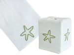 The Playful Starfish Bath Collection by Haute Home features a tissue box cover and towel set, hand embroidered on fine Italian linen with a delicate light green starfish design.
