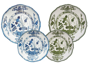 The Vida Faenza Melamine Dinnerware and Placemat Collection by Beatriz Ball features plates with ornate designs inspired by traditional Faenza Italian ceramic artistry.
