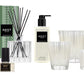 The Nest Birchwood Pine Collection offers a winter forest scent with a reed diffuser, liquid soap, perfume spray, and four holiday candles, all beautifully showcased against a white background.