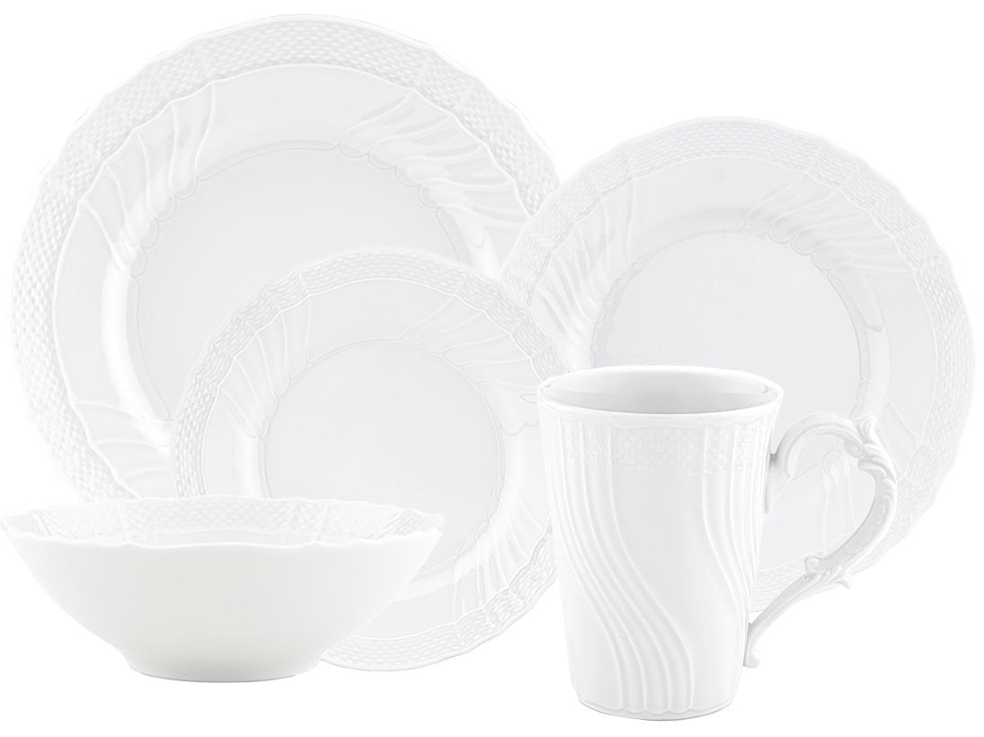The Vecchio White Dinnerware Collection by Ginori 1735 features a dinner plate, salad plate, bowl, and mug adorned with decorative patterns.