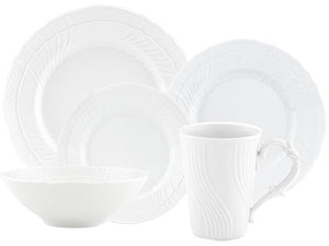 The Vecchio White Dinnerware Collection by Ginori 1735 features a dinner plate, salad plate, bowl, and mug adorned with decorative patterns.