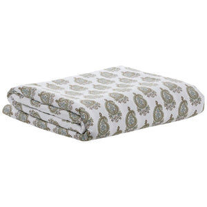 The Nilay Leaf Bedding Collection by John Robshaw features organic cotton sheets with a green and gold paisley print, neatly folded on a plain white background.
