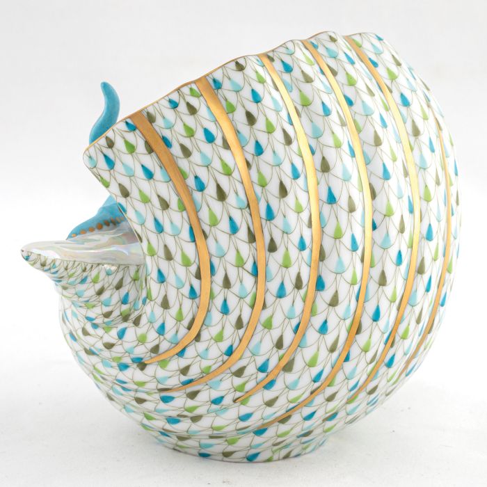 The Herend Reserve Collection Multicolor Octopus in Shell features 24k gold accents, glossy finish, and a vibrant blue and green fish scale pattern.