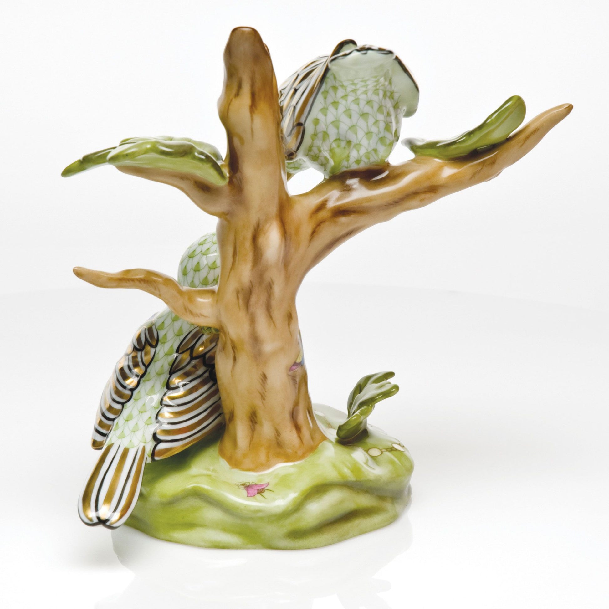 The Herend Reserve Collection The Rothschild Birds is a limited edition porcelain figurine featuring two green patterned birds on a brown tree with a green base—a must-have collectible for songbird enthusiasts and nature lovers.