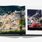 An open book from Assouline’s "Villa Treville Positano" displays a hillside town with vibrant buildings—reflecting the iconic charm of the Amalfi Coast's Villa Treville hotel—on the left page, while the right page features people cruising along the coastline in a red convertible, capturing the essence of a luxury hotel escape.