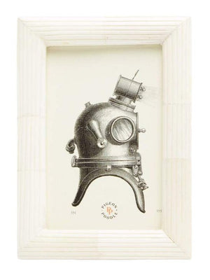 From the Velden Frame Collection by Pigeon & Poodle, this framed illustration of an antique deep-sea diving helmet with hand-etched ribbing features "Pigeon Trouble" printed below the image.