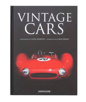 Assouline's "Vintage Cars (2nd Edition)" features a striking book cover with a front view of a red vintage race car displaying the number 20 on its hood. Showcasing luxury photography by Laziz Hamani and an introduction by Ken Gross, this edition is a stunning tribute to automotive history.