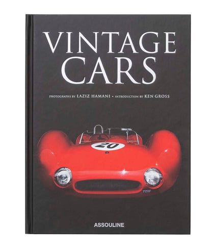 Assouline's "Vintage Cars (2nd Edition)" features a striking book cover with a front view of a red vintage race car displaying the number 20 on its hood. Showcasing luxury photography by Laziz Hamani and an introduction by Ken Gross, this edition is a stunning tribute to automotive history.