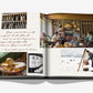 The pages of Wine & Travel Italy by Assouline open to unveil an elegant living room scene, showcasing a wine cellar stocked with the finest selections from Italian vineyards and a tasteful pairing of cheese and wine. Nearby, a person glides through a snowy landscape on skis. A quote about life's pleasures graces the page, evoking dreams of wine tourism escapades.