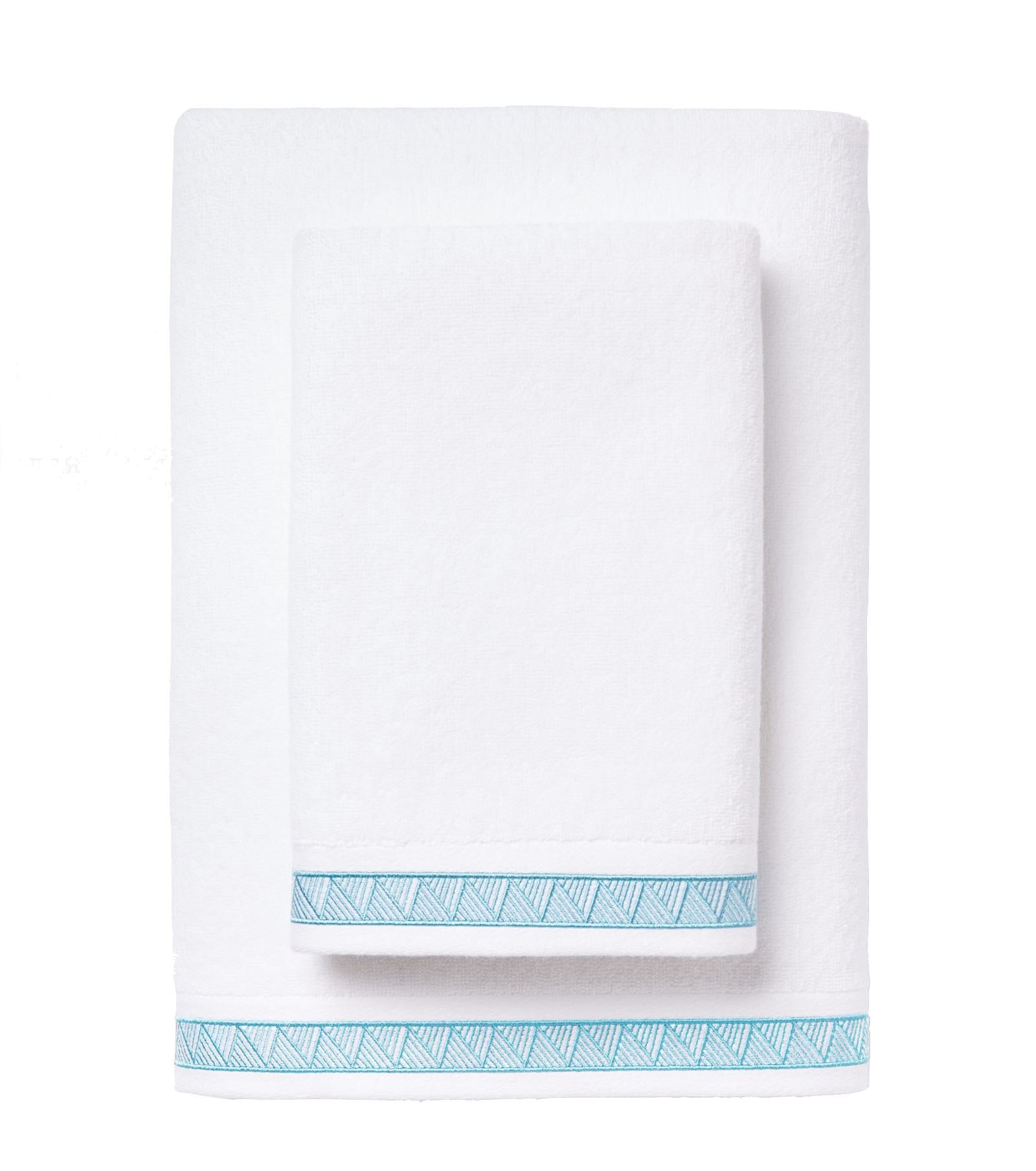 Two folded Averylily Weave Bath Collection towels, one large and one small, with decorative blue geometric borders, rest on a white background. Ultra-absorbent Aegean Cotton for daily use.