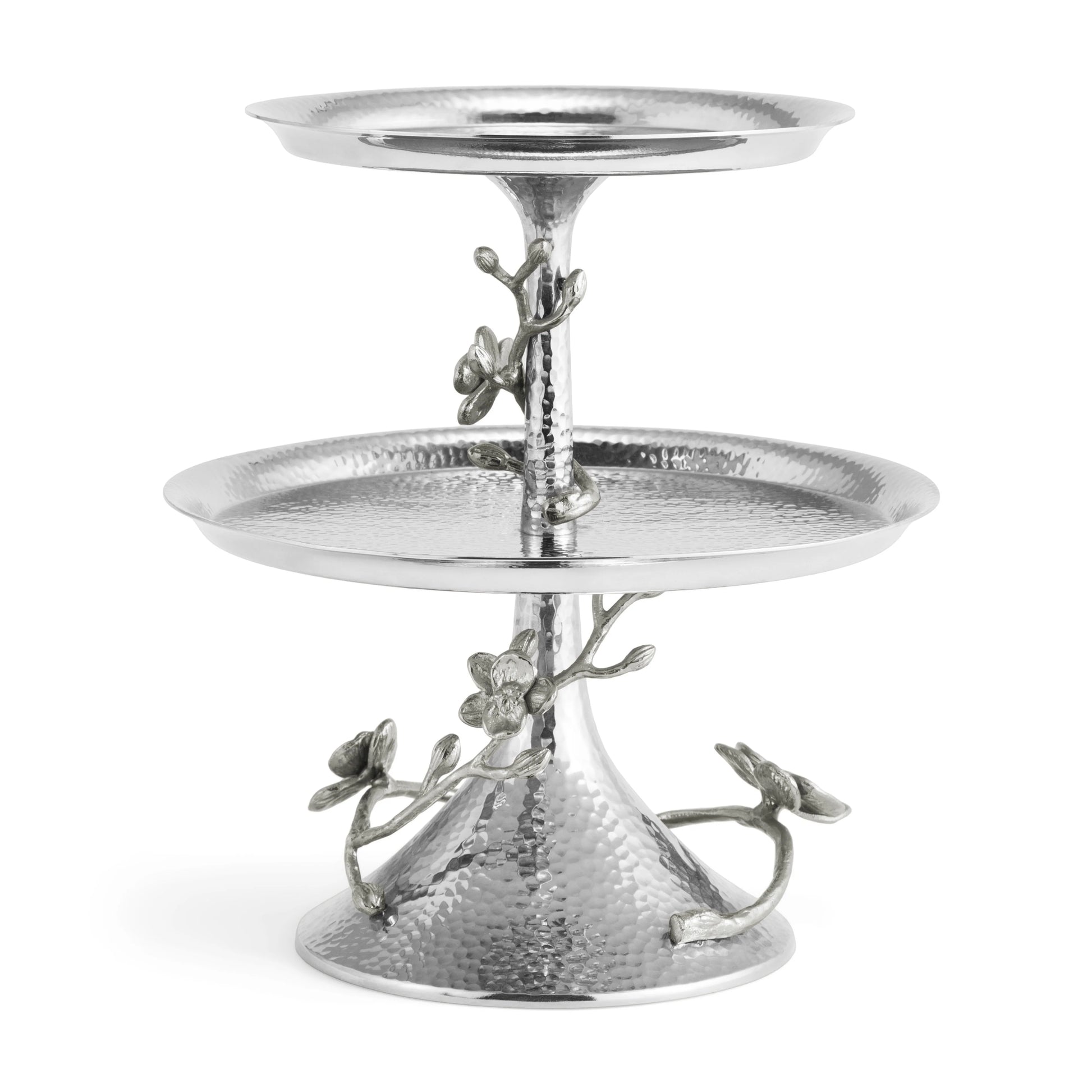 A two-tiered hammered metal serving tray from Michael Aram's White Orchid Serveware Collection, featuring floral branch accents around the stand and base.