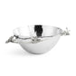 A silver hammered metal bowl from the Michael Aram White Orchid Serveware Collection, featuring decorative branches and flower accents on the rim, evoking purity and subtle mystery.
