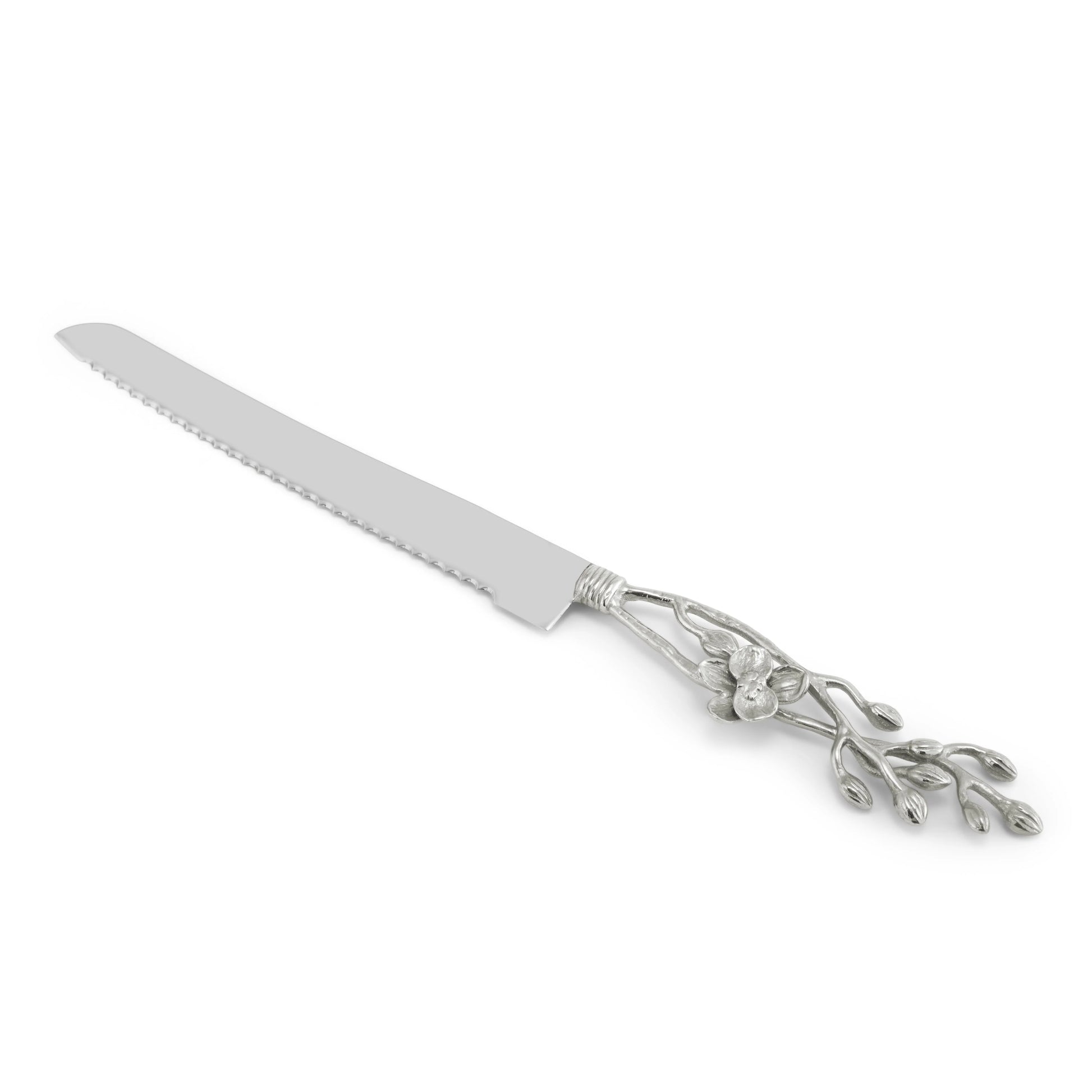 A silver serrated knife from Michael Aram’s White Orchid Serveware Collection, featuring a decorative handle with a floral and branch motif that evokes purity and quiet mystery.
