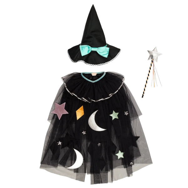 The Meri Meri Tulle Appliqué Witch Cape, Hat & Wand set from the brand Meri Meri features a black witch costume with a hat adorned with a turquoise bow, a black tulle cape embellished with colorful stars and moons, and a star-shaped wand. Ideal for imaginative play and Halloween dress-up, this enchanting ensemble provides a magical effect.