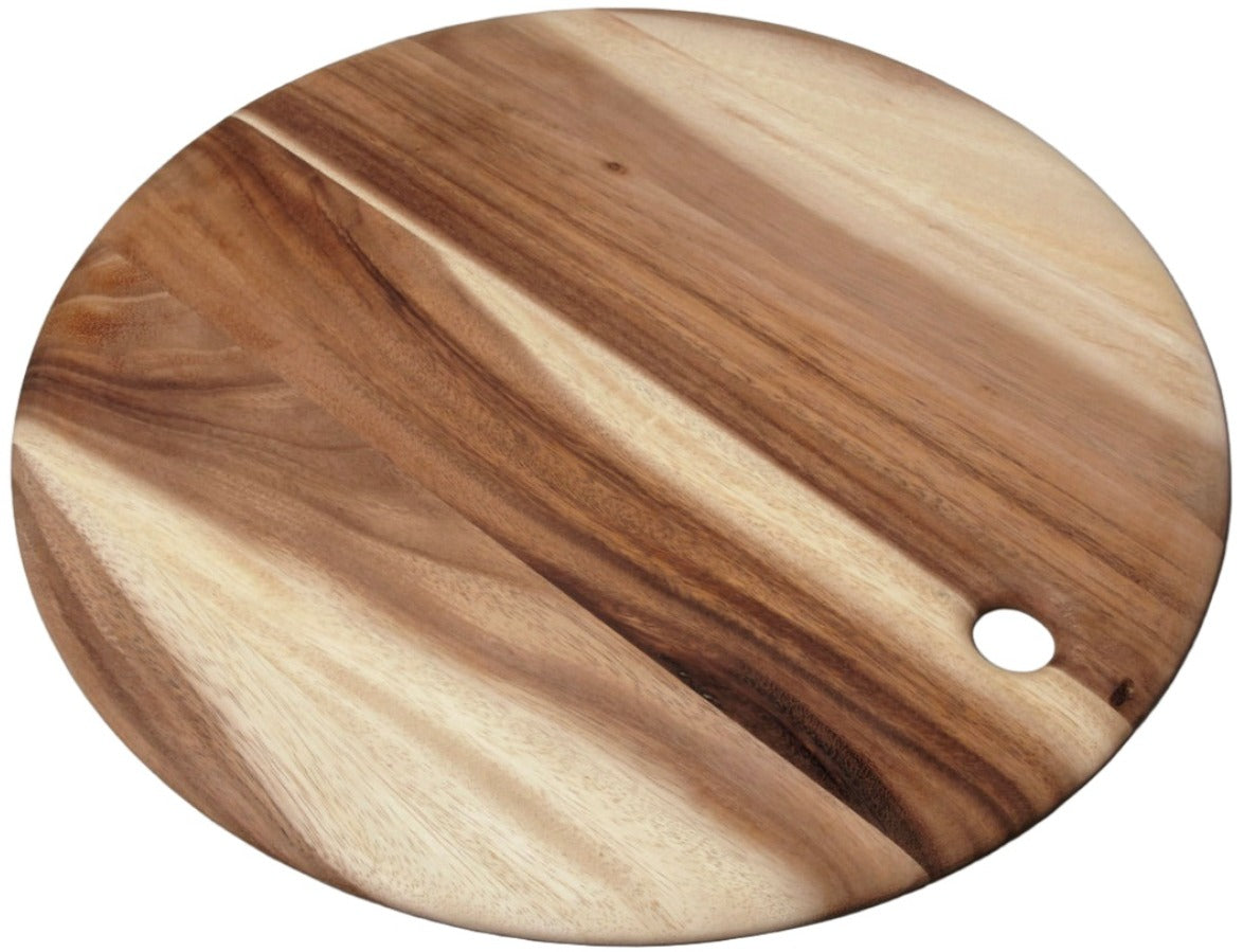 The Be Home Acacia Wood Round Board Collection features handcrafted round boards with a small circular hole near the edge, showcasing beautiful natural acacia wood grain patterns.