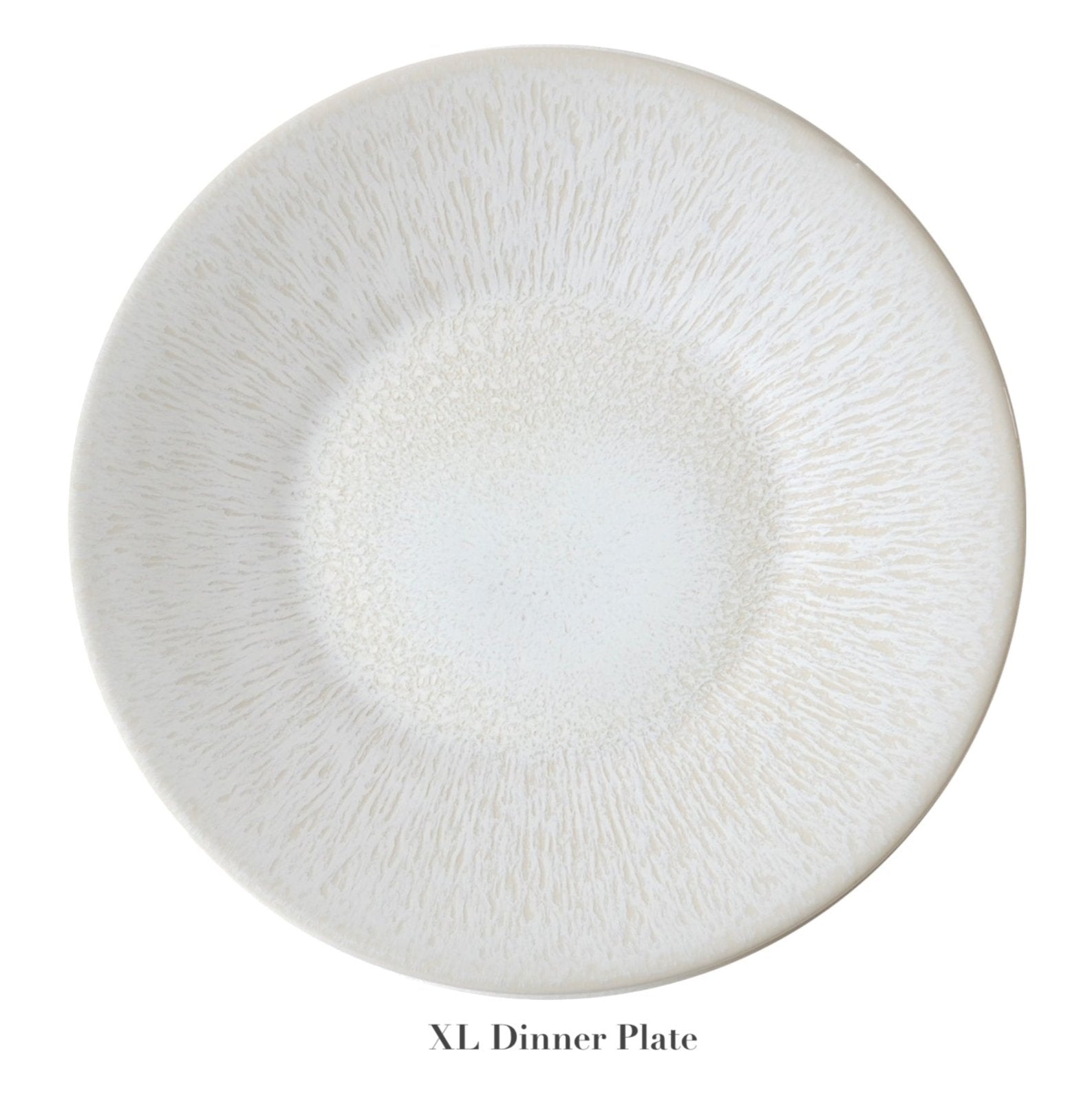 A large, round, white dinner plate with a textured radial pattern and subtle perle glaze from the Vuelta White Pearl Collection by Jars. "XL Dinner Plate" is displayed below the plate.