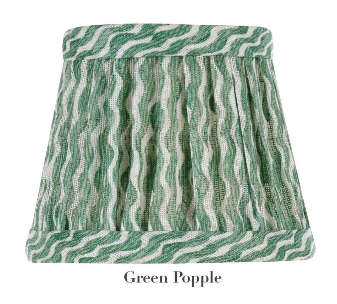 Introducing the Zafferano x Fermoie Poldina Lampshade Collection by Zafferano America, featuring hand-made lampshades with wavy lines embodying Fermoie design. This green patterned piece adds elegance and character, making it a perfect statement for any room.