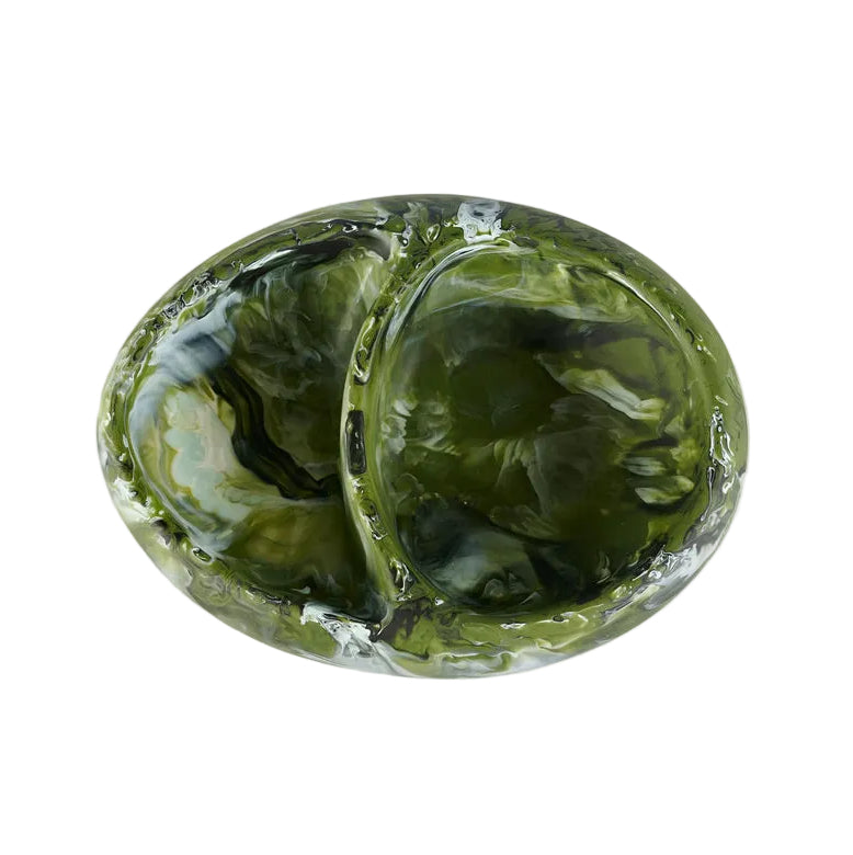 The Nashi Home Serveware Collection, Forest by Nashi Home features a green marbled glass dish with two connected oval compartments—ideal as a unique serving piece or an eye-catching home accent.