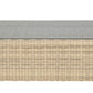 The Zeya Grande Outdoor Coffee Table by Janus et Cie features a weather-resistant woven rattan base and flat glass top, perfect for outdoor entertaining, shown against a plain white background.