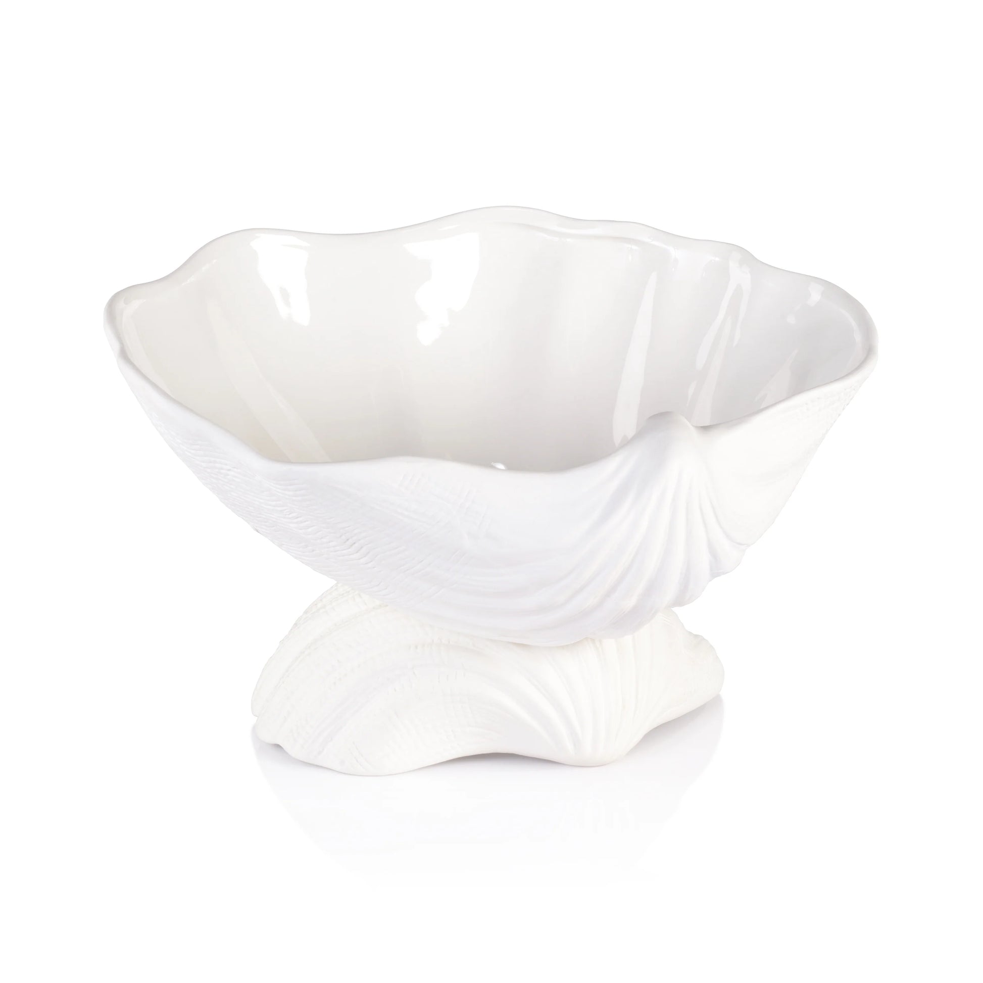 The Zodax La Coquille Stoneware Clam Shell Bowl features a glossy interior, textured exterior, and shell-like base, bringing coastal elegance and charm to any décor.
