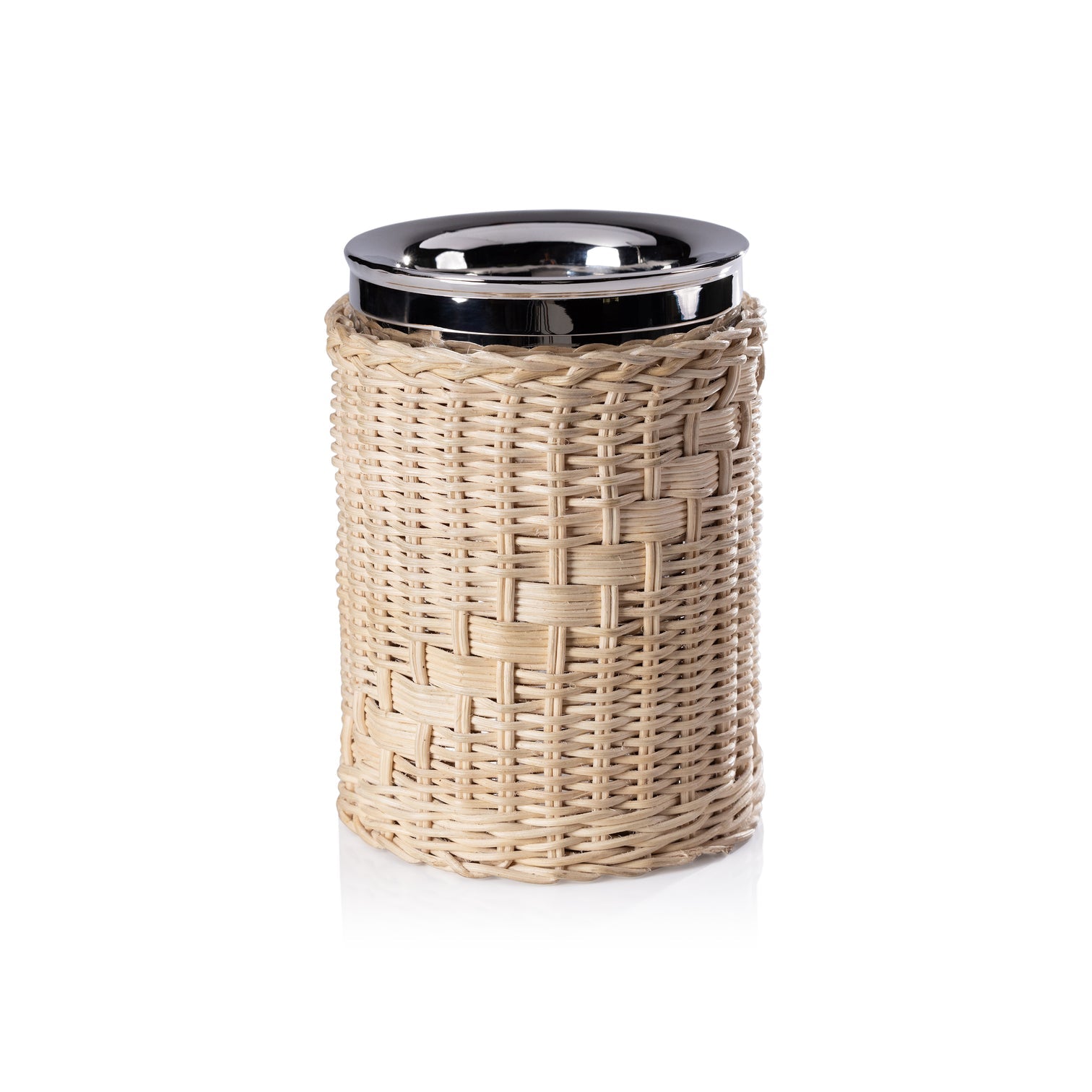 A glass jar from the Zodax Palmier Barware Collection, featuring a shiny metal lid and hand-woven rattan wrap, stands upright against a white background in this elegant display.