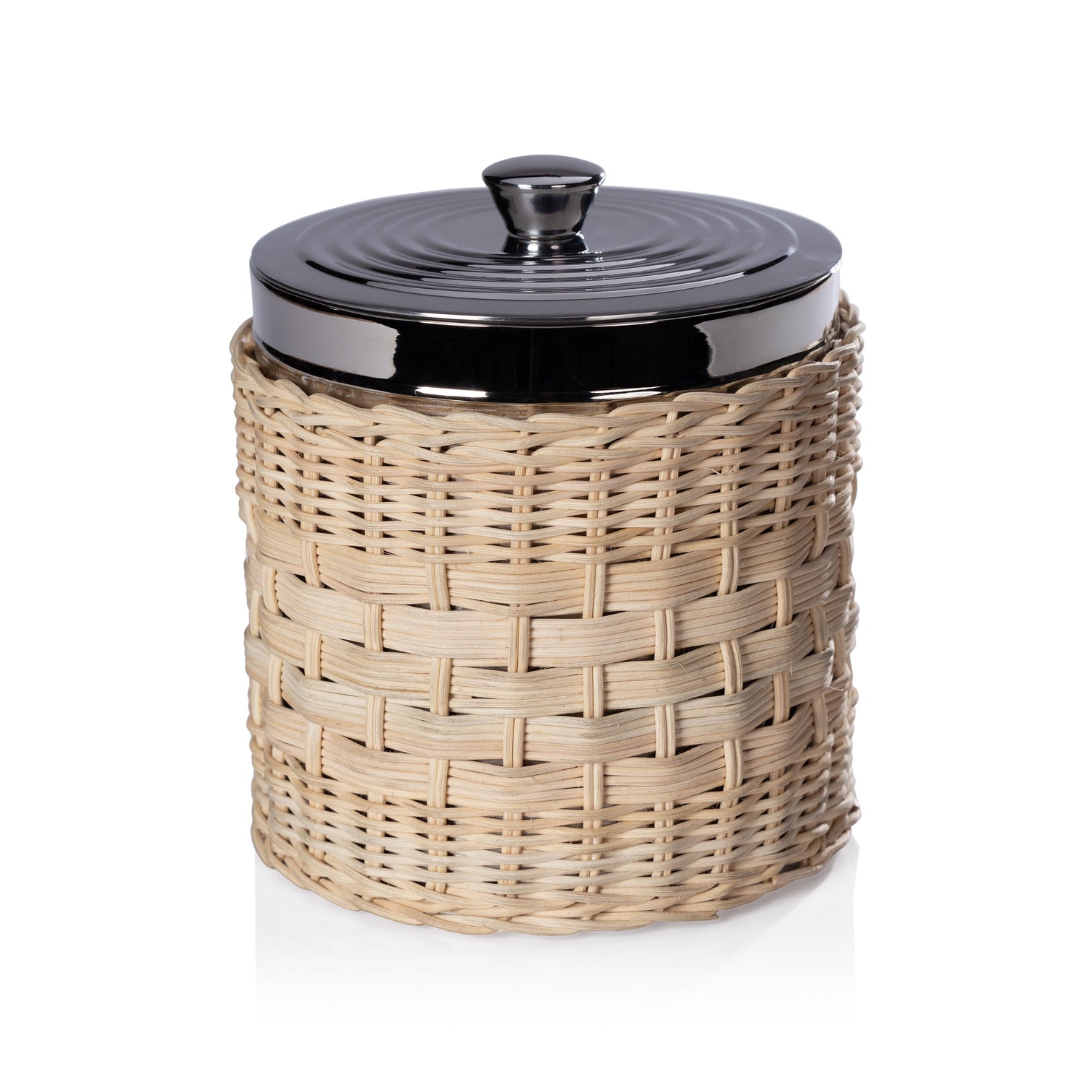 A cylindrical glass jar with a black lid, encased in a hand-woven rattan wicker basket, serves as a wine cooler from the Palmier Barware Collection by Zodax, shown isolated on a white background.