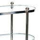 The Zodax Oval Round Bar Cart Trolley features a modern glass and chrome design with rounded edges, two shelves, and spherical metal accents—ideal for showcasing your favorite bar accessories.
