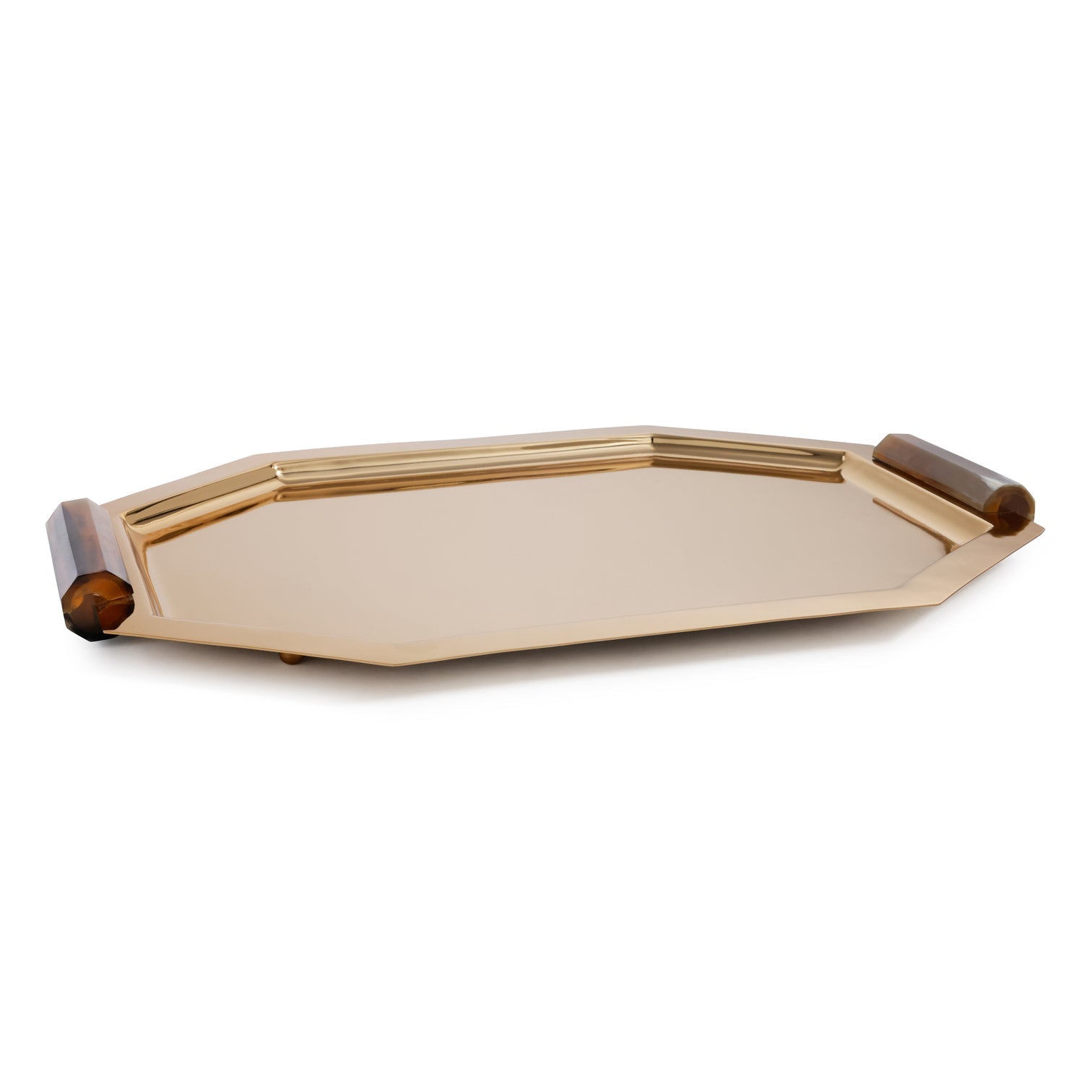 The Zodax Octagon Metal Tray with Horn Handle Collection features a polished gold serving tray with raised horn handles, a reflective surface, and geometric octagonal edges.