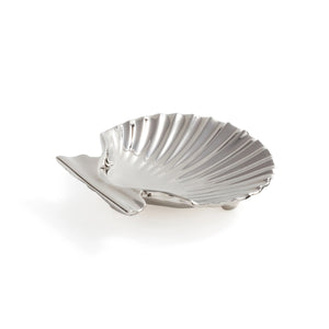 The Zodax Sanibel Shell Tray features a silver, textured scallop shell design, making it a perfect gift for beach lovers. Photographed on a white background.