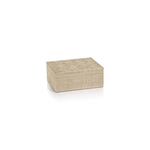 The La Bocca Woven Raffia Box Collection by Zodax features a rectangular beige box with a lid and subtle zigzag top, offering artisanal charm and stylish storage. Shown here against a plain white background.