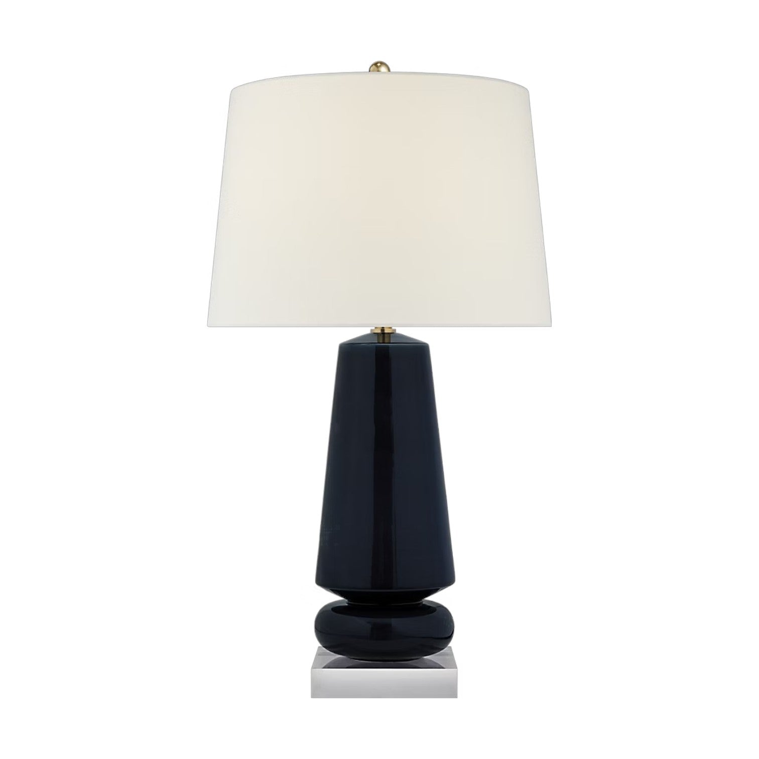 The Parisienne Lamp Collection by Visual Comfort features a modern table lamp with a glossy black ceramic body, a large white fabric shade, and a reflective square base to create an inviting ambient glow.