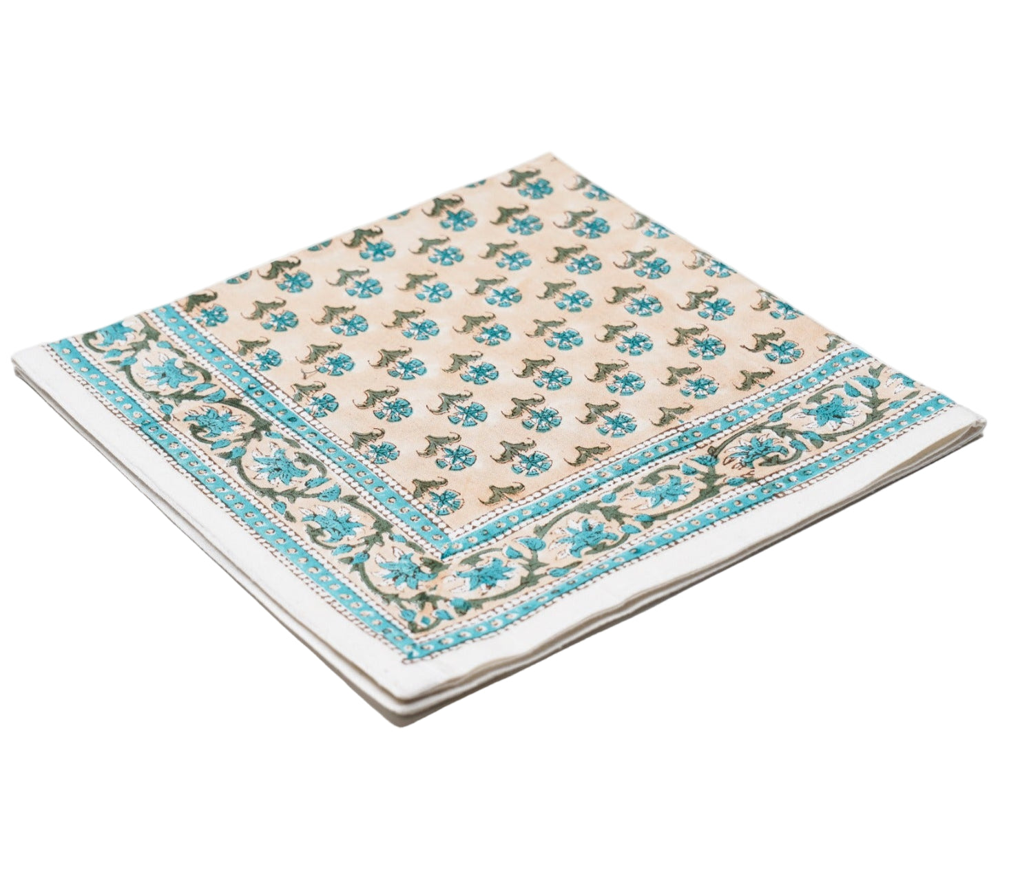A folded cloth napkin from SLOANE BY HAND's Alwar Table Linen Collection, featuring a beige background with blue and green floral patterns and a matching border—ideal for pairing with hand block printed table linens or napkins.