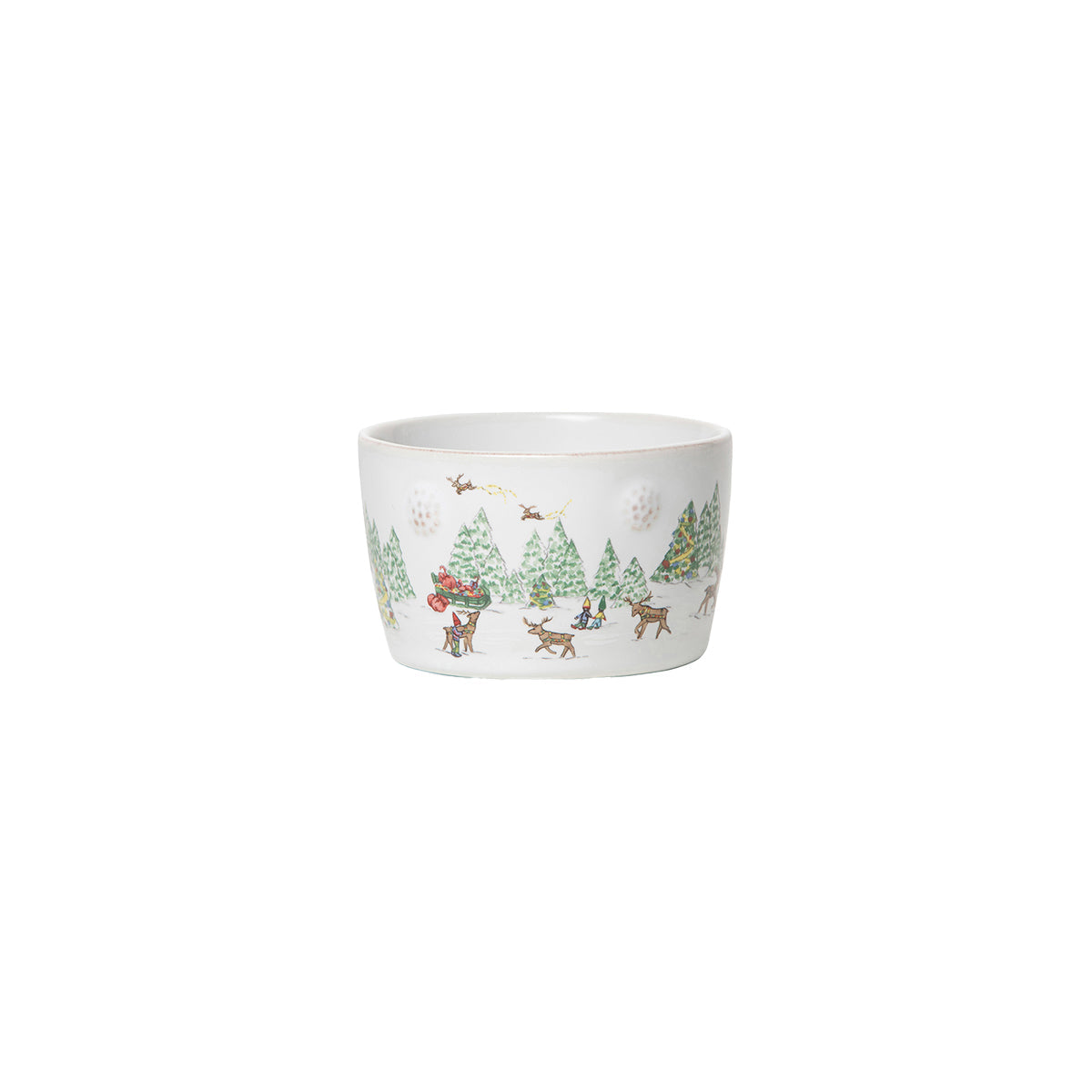 Add festive charm to your holiday table with Juliska’s Berry & Thread North Pole Dinnerware and Serveware Collection, featuring white ceramic bowls with Santa in a sleigh among pine trees and snowflakes.