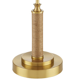 Close-up of the base of the Currey and Company Ippolito Brass Console Lamp, featuring a cylindrical brass stem wrapped in tan jute rope.