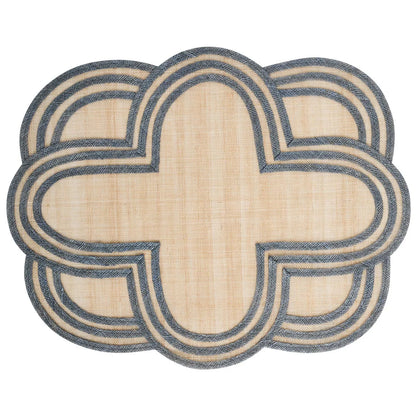The Juliska Scallop Stripe Placemat Collection features a beige woven center with a layered geometric border in dark blue and beige, perfect for enhancing your table settings.