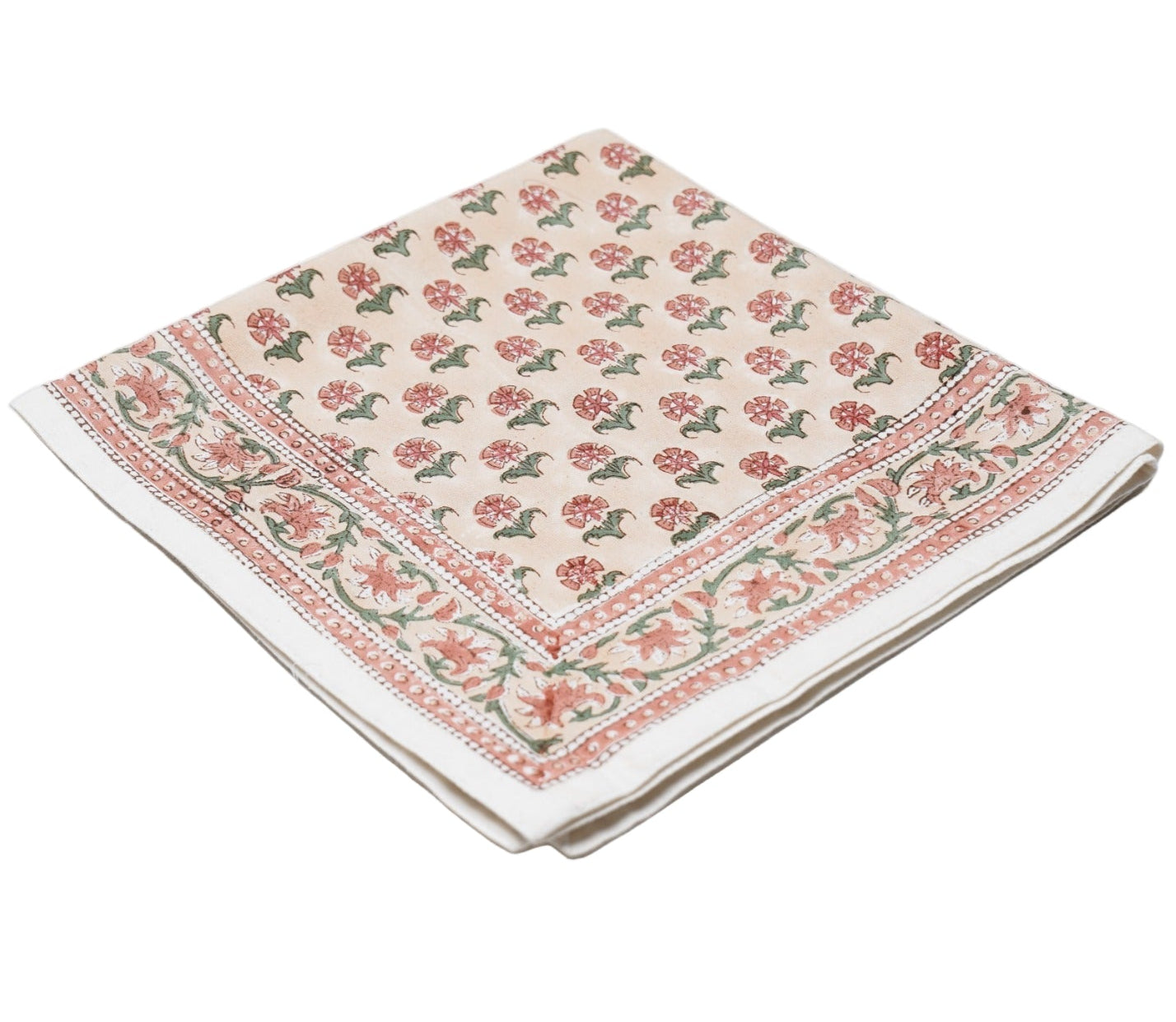 A folded beige cloth napkin from the Alwar Table Linen Collection by SLOANE BY HAND, featuring hand block printed red and green florals with a decorative border—ideal for mixing and matching with your favorite tableware.