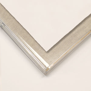 A close-up of The Kew Collection #1 by Natural Curiosities shows the back corner of its stretched canvas with a sleek metal frame, ideal for bringing a nature-inspired touch to any space.